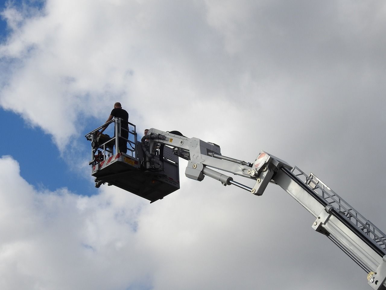 worker on elevating working platform